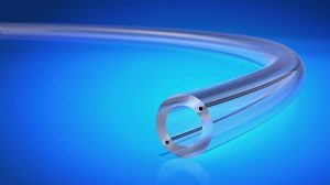 Such tubing offers a design solution for medical systems which require the use of inert material solutions for drug delivery applications or bondable outer tubing layers