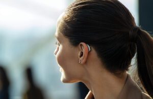 A woman wearing a hearing aid