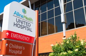 An Allina Health sign outside United Hospital in St. Paul