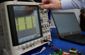 An engineer develops the pulsed waveform output for a PFA system