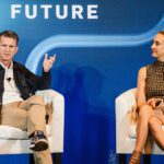 MasterControl executives Jon Beckstrand and Alicia Garcia on stage at the 2022 MasterControl Summit event