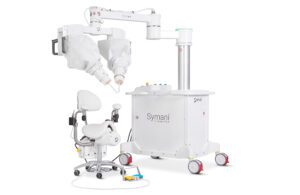 A photo showing the Symani surgical robotics system