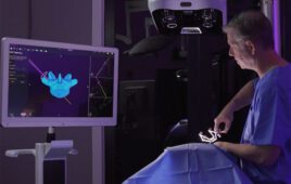 A surgeon using the Proprio Paradigm system to visualize a spine surgery.